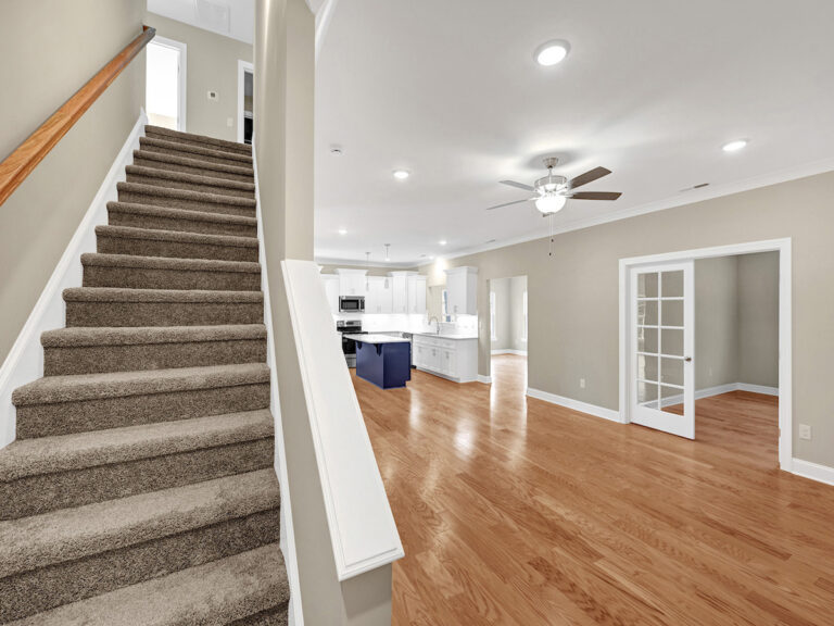 5445 Foxdale Drive, new listing by Dreambuilders WS. View of the stairs to second floor bedrooms.