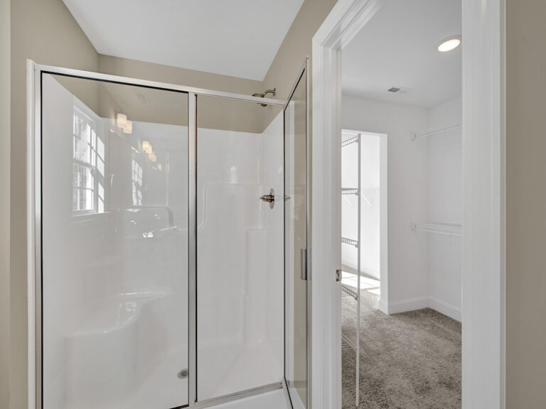 5445 Foxdale Drive, new listing by Dreambuilders WS. View of the primary shower and walk in closet.