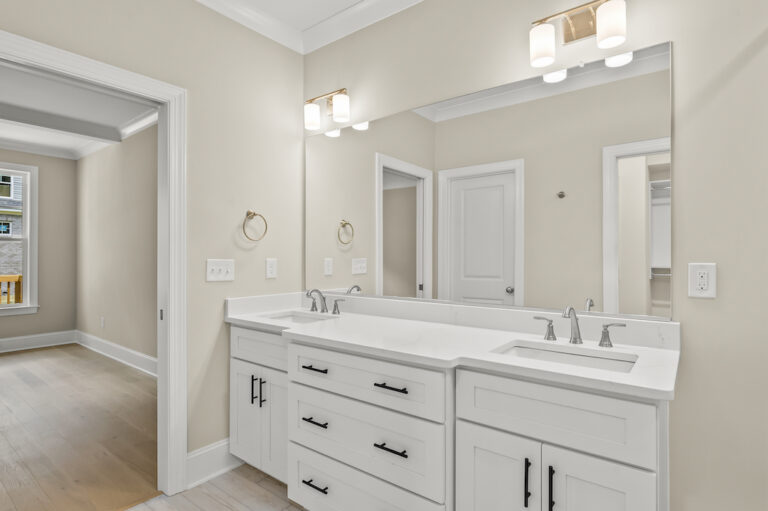 Primary bath vanities at 557 Alpine Road.
