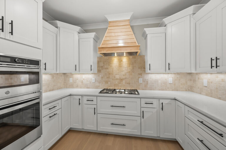 543 Barrett Road, photo of the high end appliances and custom hood and tile work.